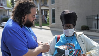 community health workers out in the neighborhood working