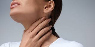 Woman with sore throat
