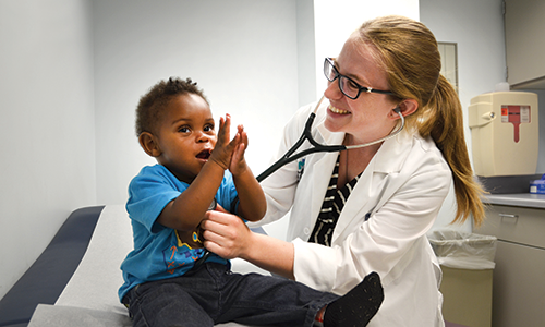 Doctor with Young Child