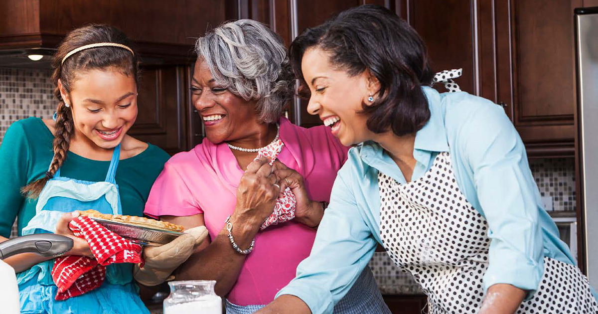 Three Women Cooking in Kitchen