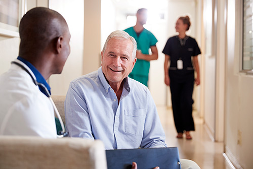 Man discussing Medicare Wellness Visit with healthcare professional