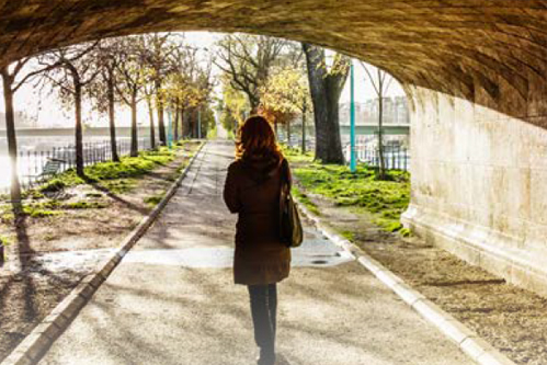 Woman Walking Alone in Pain
