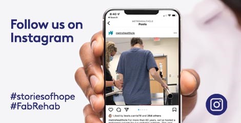 Person holding cell phone viewing Stories of Hope on Instagram