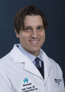 Justin E. Dvorak, MD