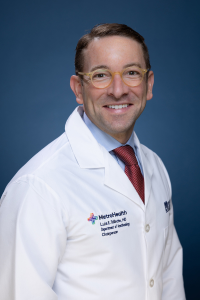 Luis E. Tollinche, MD