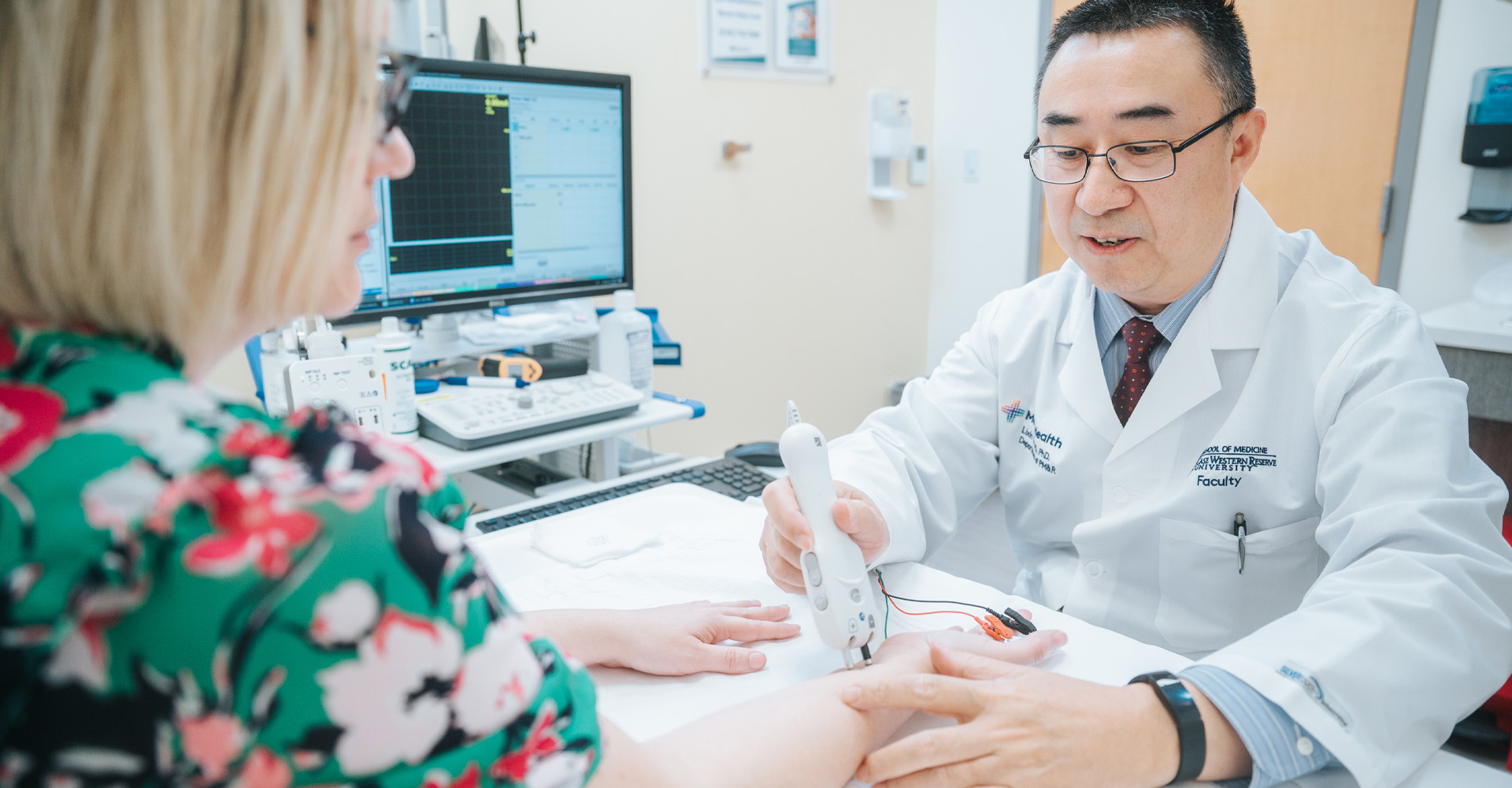 Doctor working with patient