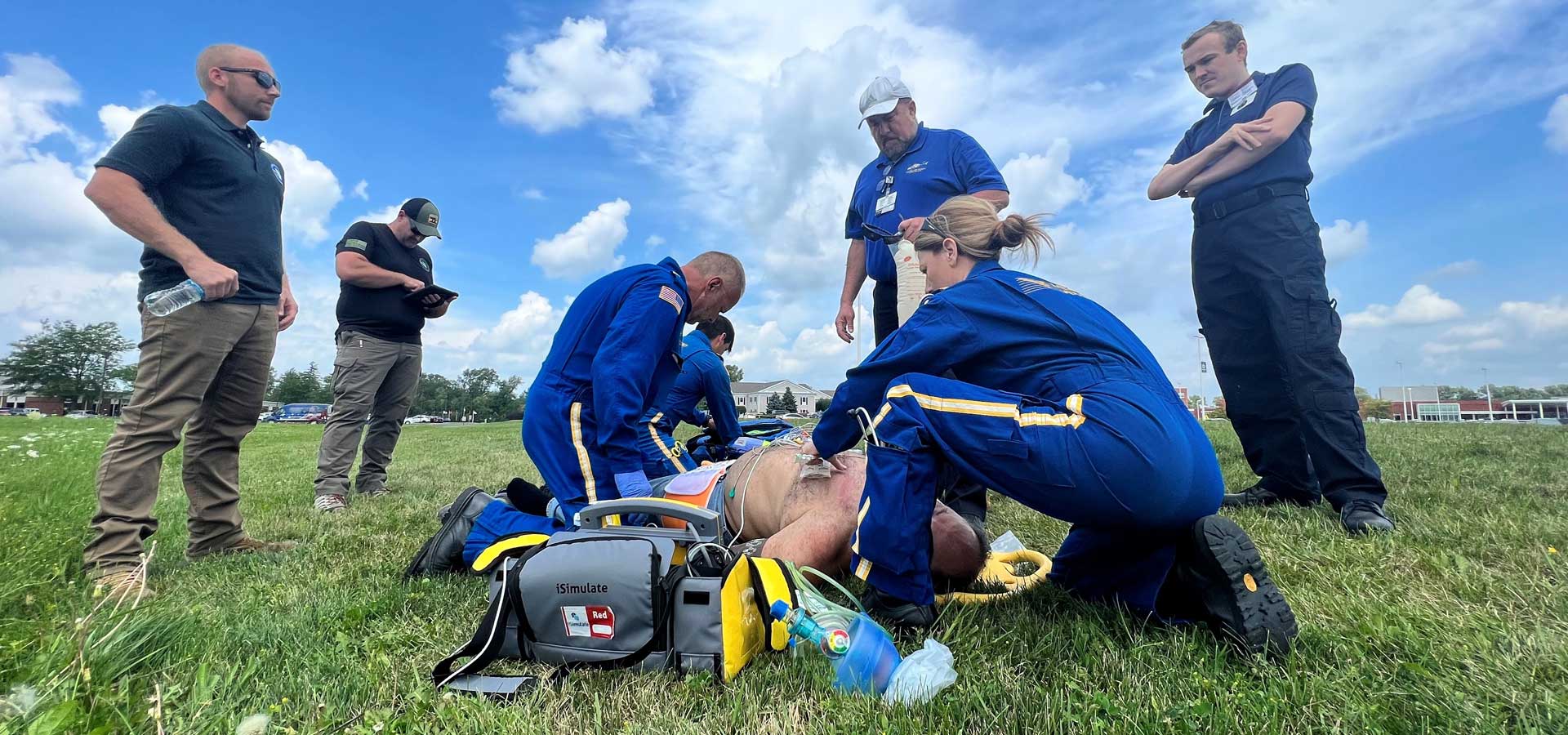 LifeFlight members working on a patient in the field