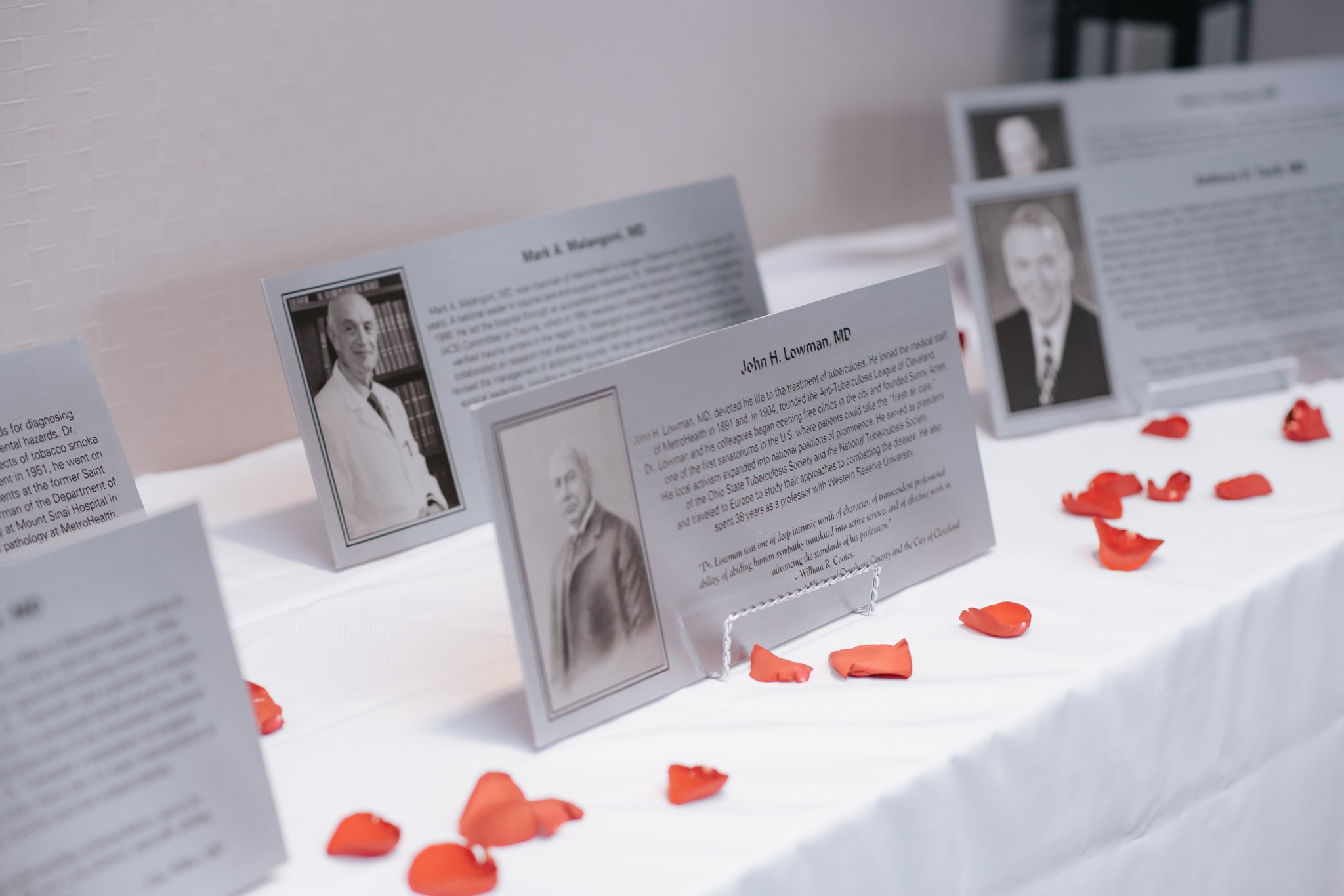 table with Hall of Honor inductees cards on it