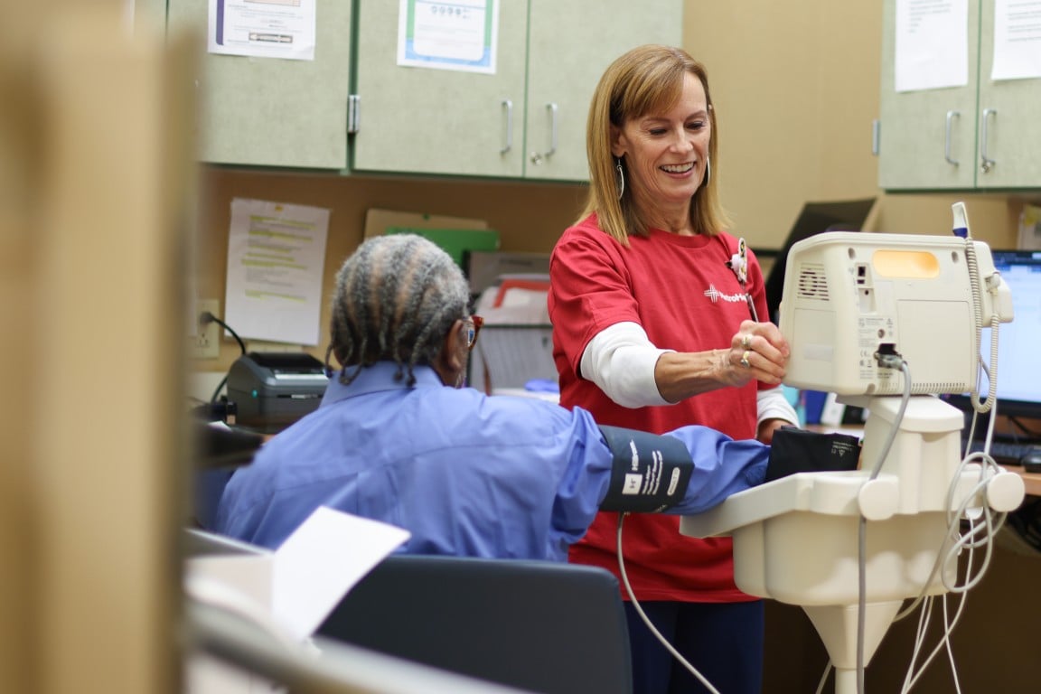 Patient getting a medical test at a health fair
