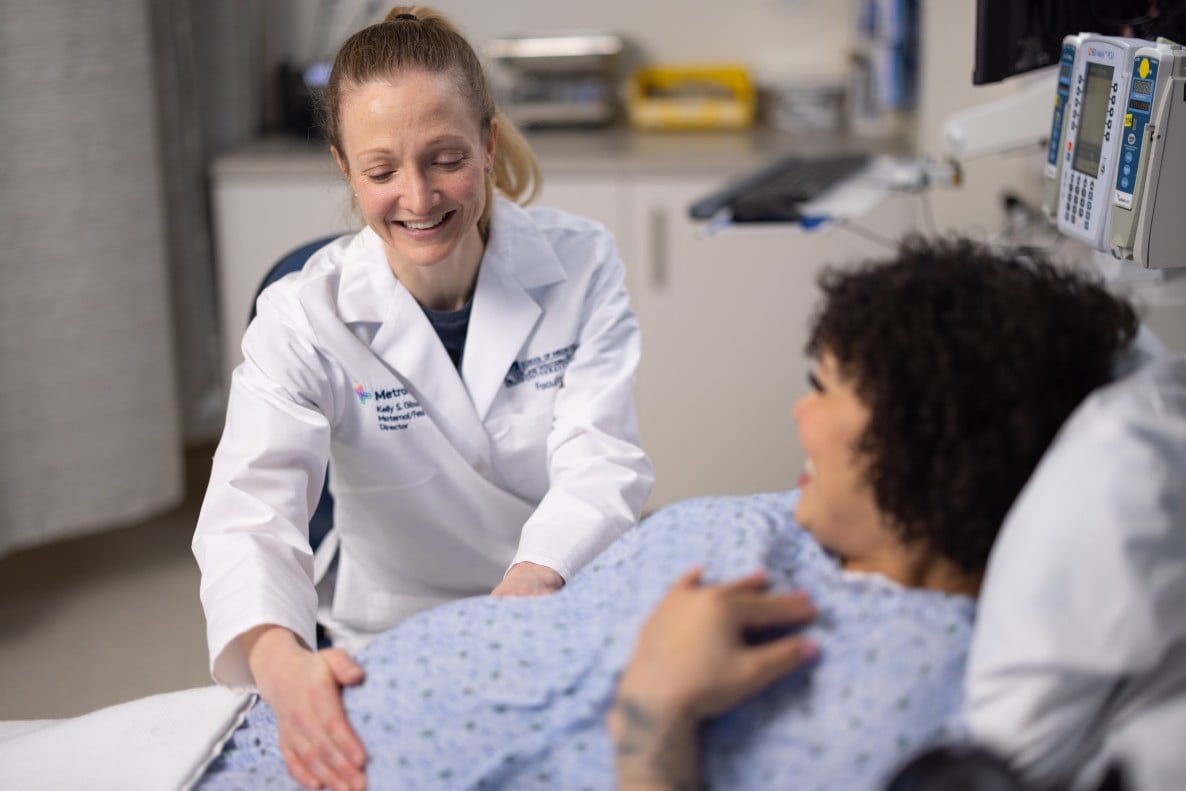 A pregnant woman attended by a MetroHealth OB-GYN