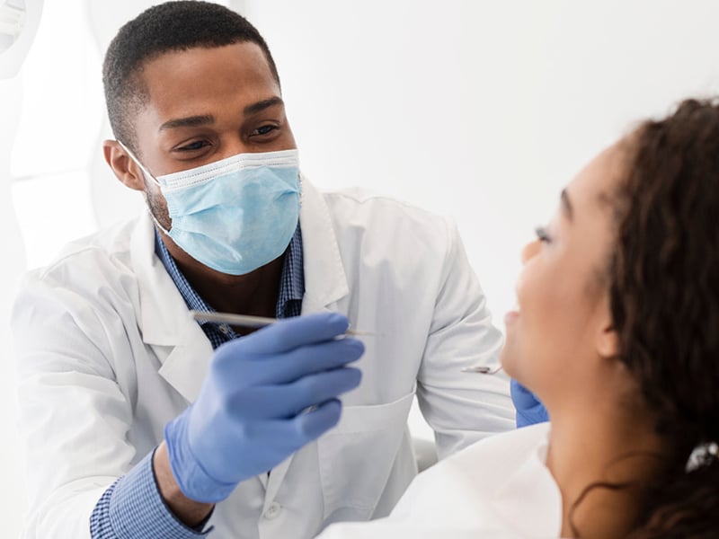 A dentist and patient