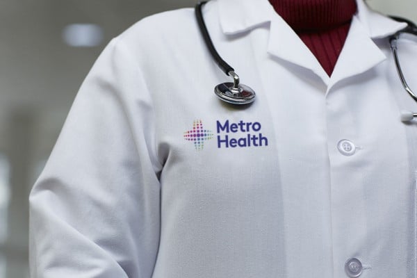 A MetroHealth provider wearing a white coat