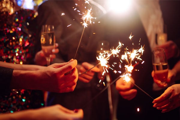 People celebrating with sparklers