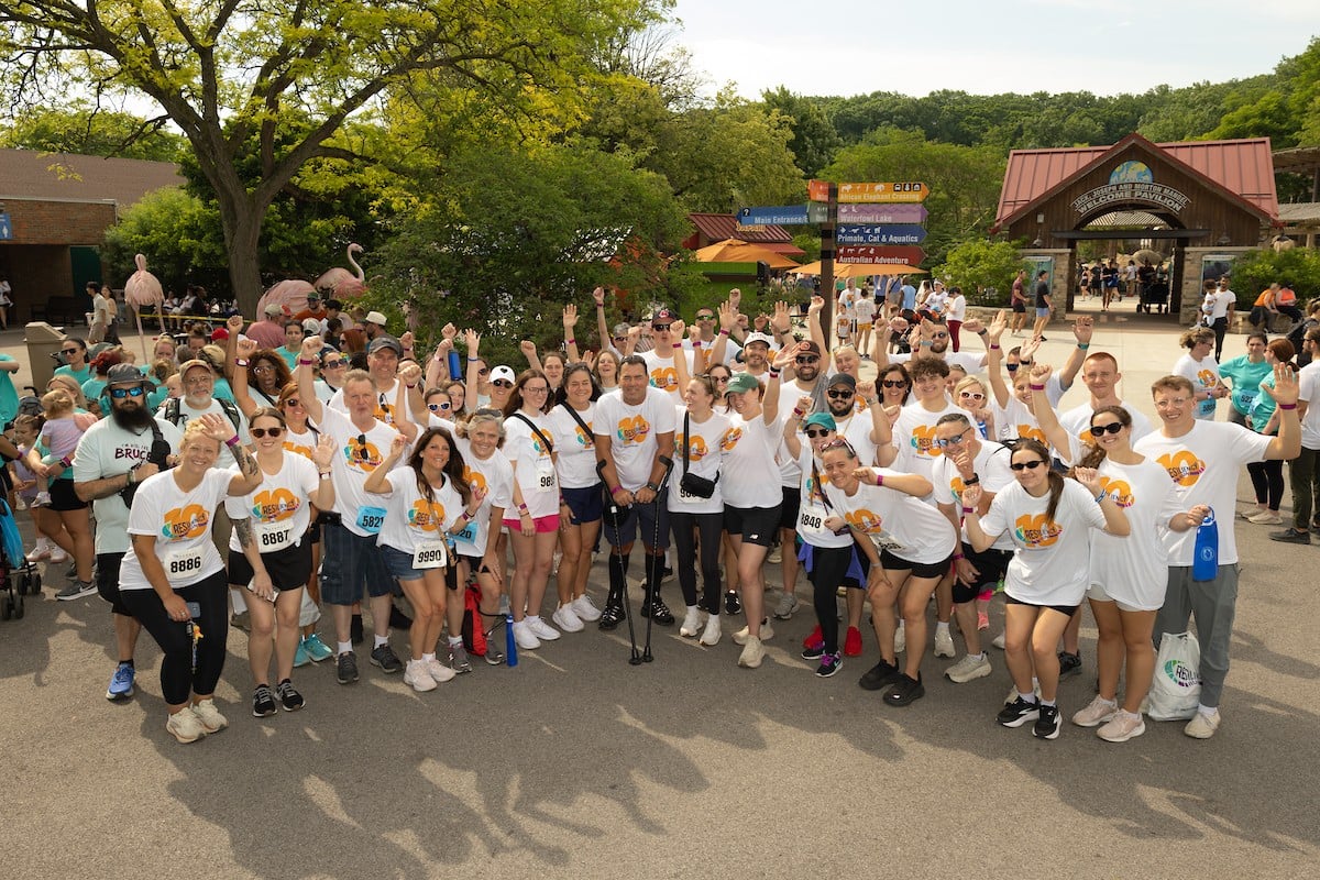 A large gathering of Resiliency Run participants cheering