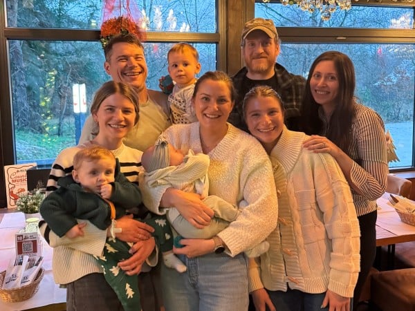 Diane's children and grandchildren gathered for a group photo in a restaurant