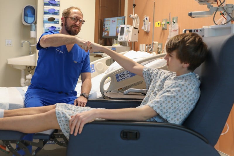 Dr. Justin Mistovich and an orthopedic patient
