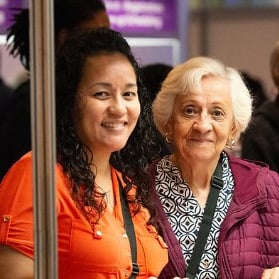 Two women at a community health event