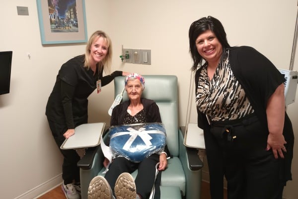 Kelley Tomaro with a patient and a nurse