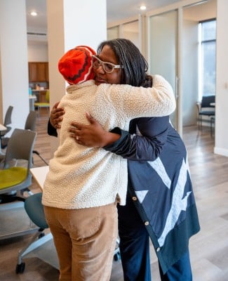 Linda Hunter and Renee Harris hugging