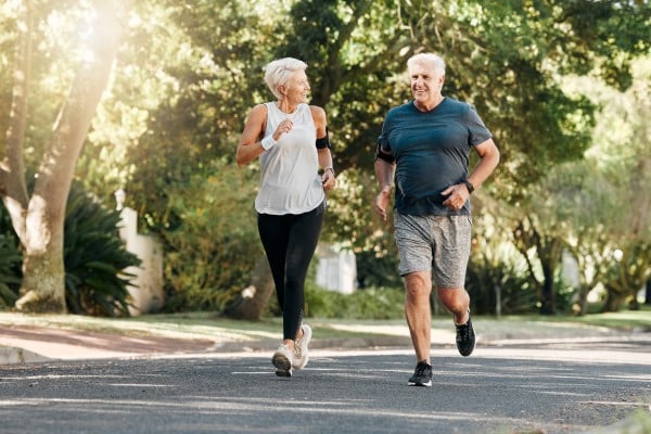 Elderly couple jogging to stay active