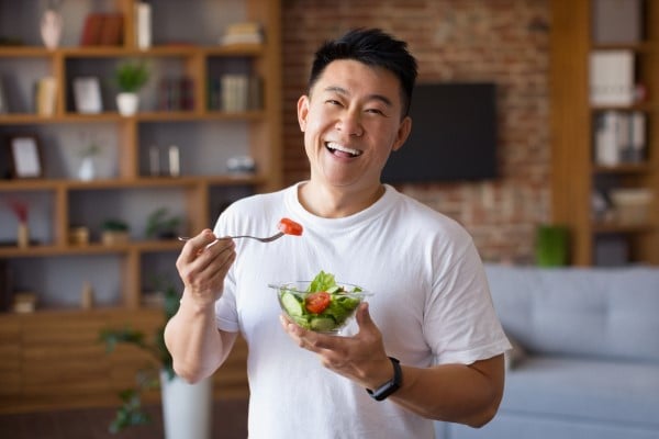 Man enjoying a salad