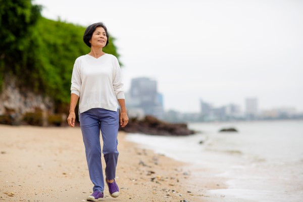 Woman walking on the beach