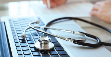 stethoscope on laptop