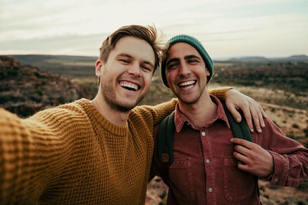 Two men backpacking on a mountain