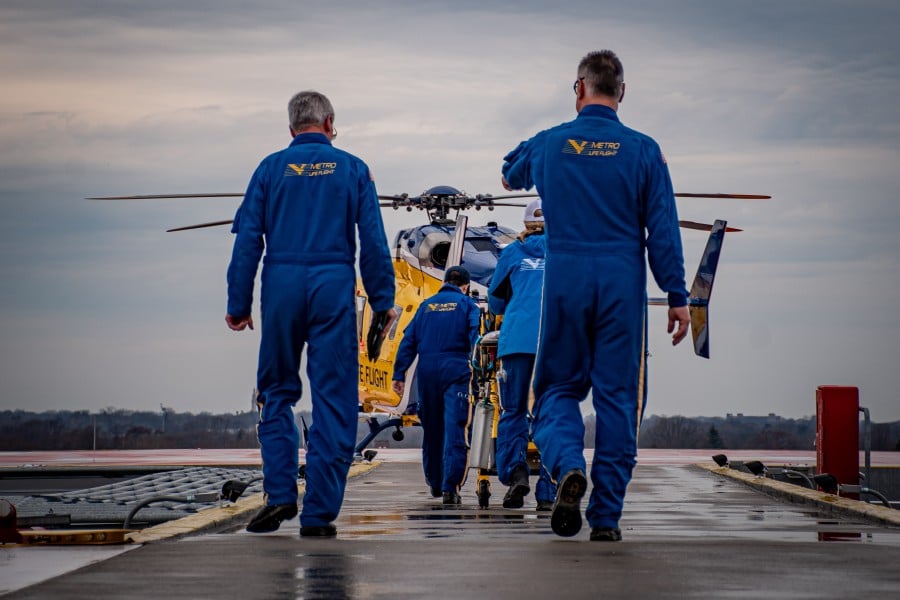Metro Life Flight crew walking to the helicopter