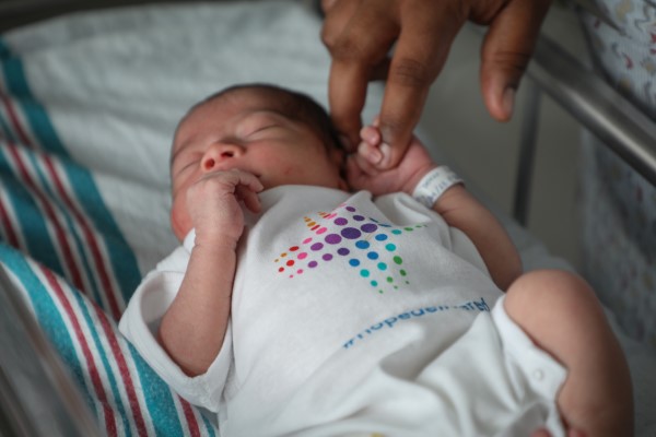 newborn infact in crib