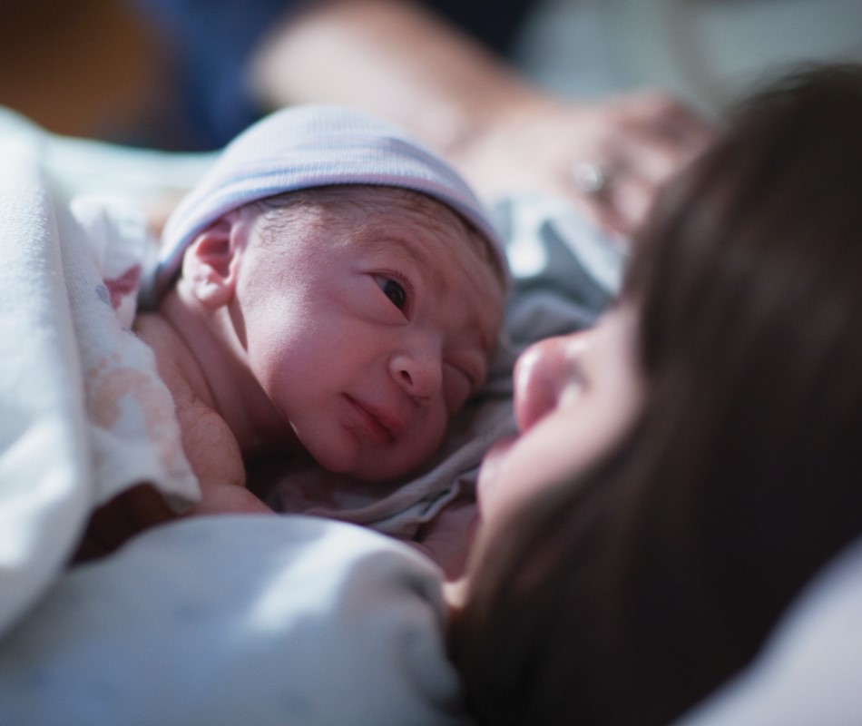 New mom holding baby