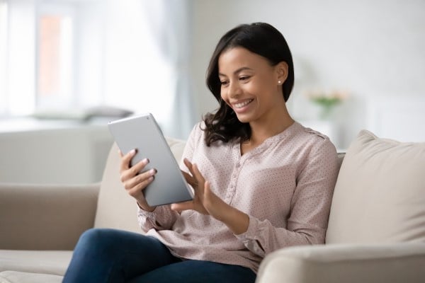 woman reading tablet