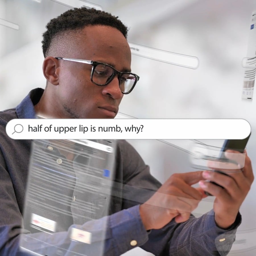 Man searching for information on his phone