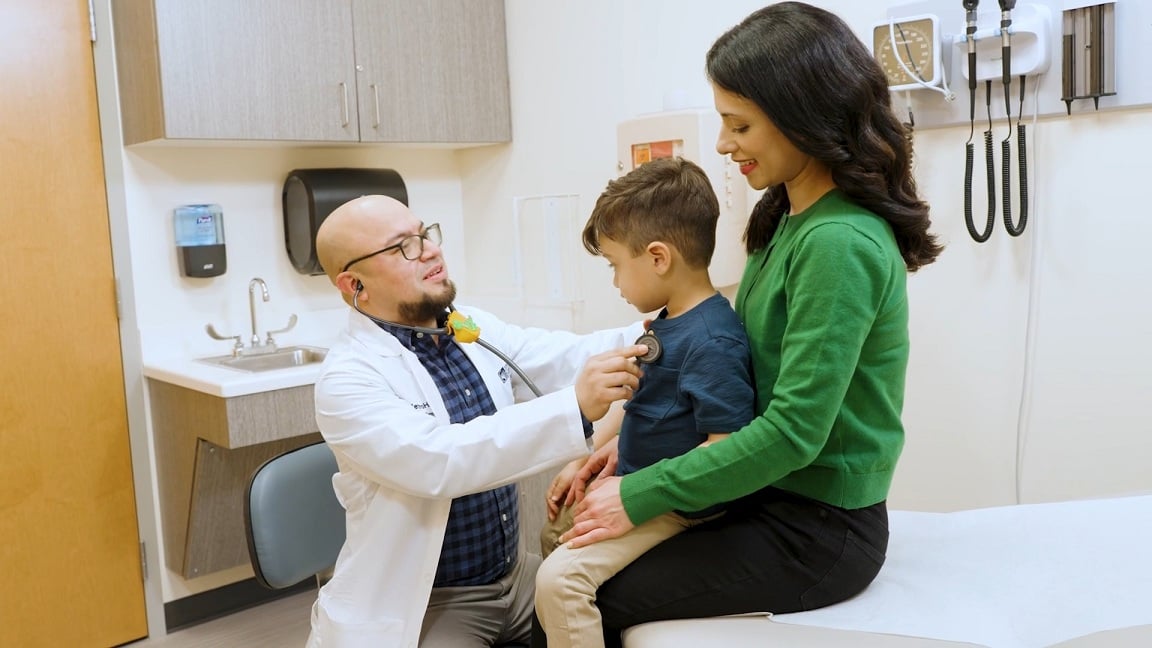 A child getting checked on by a doctor