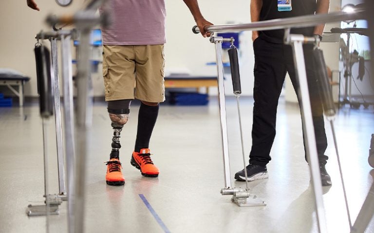 Outpatient Rehab therapist and patient