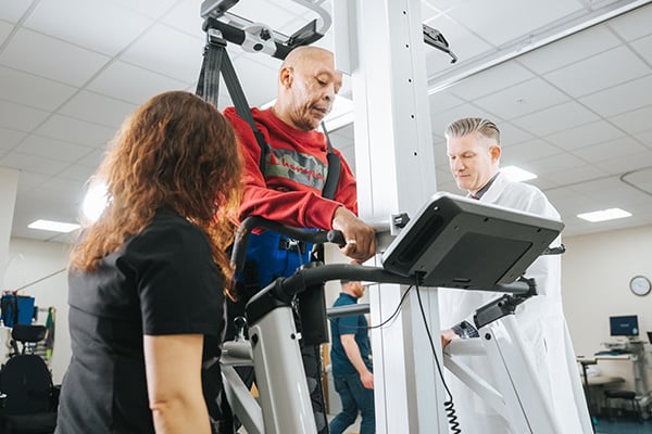 A Rehabilitation patient on a specialized treadmill