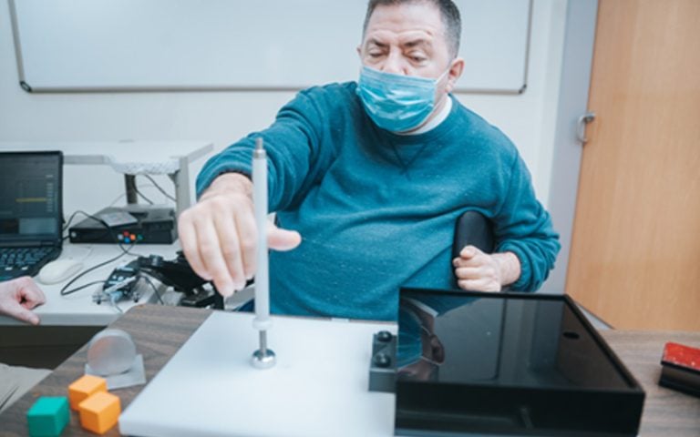 A Rehabilitation patient practicing motor skills