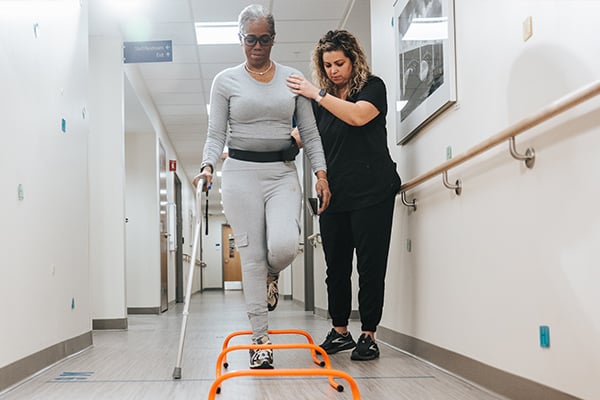 Patient working on balance with provider