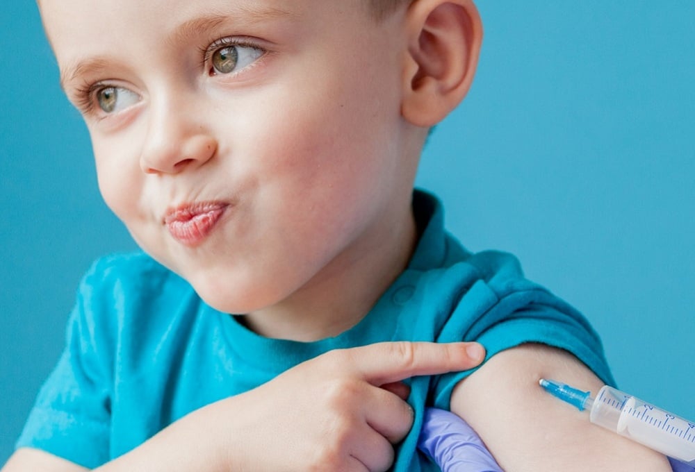 Child receiving a vaccine
